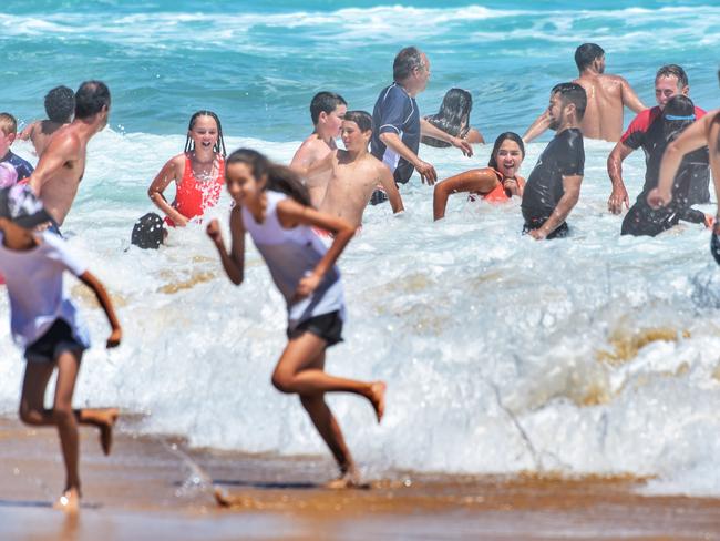 Gunnamatta Surf Beach: Lifeguards Victoria staff watch over swimmers at one of Victoria's most dangerous beaches. Picture: Tony Gough