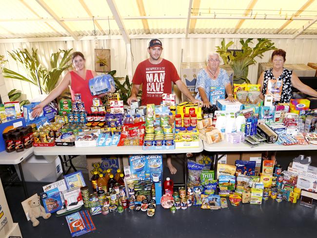 ASSEMBLING donated itesm for victims of the NSW bushfires are Cheyenne Wicket, Jye Bartley, Glenice Ellis and Wendy Bartley.The group managed to collect enough itesm to fill two dual cab utes and two tandem traislesr in jyst three weeks for distribution at Casino. Phot: RICHARD MAMANDO