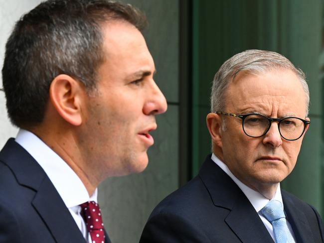 Australian Prime Minister Anthony Albanese listens to Australian Treasurer Jim Chalmers speak to the media during a press conference tat Parliament House in Canberra, Tuesday, February 28, 2023. (AAP Image/Lukas Coch) NO ARCHIVING