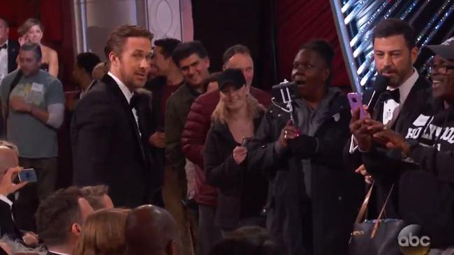 Ryan Gosling greets the bunch of randoms as they crash the awards.