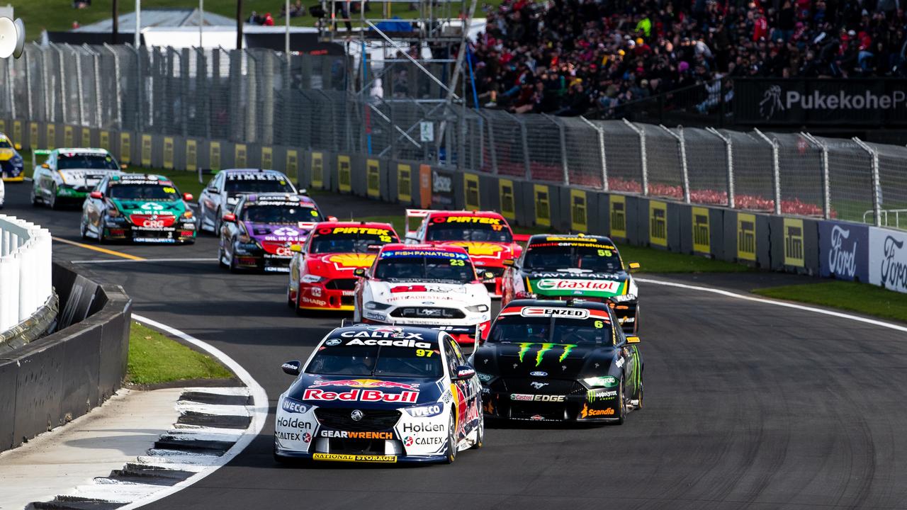 Close racing: Shane van Gisbergen leads Cameron Waters in NZ on Saturday.