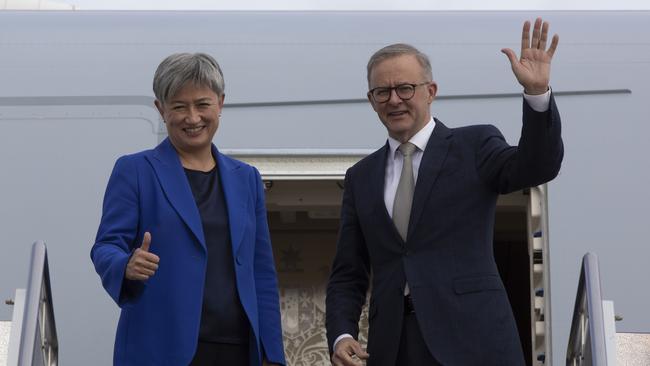 The new Prime Minister, Anthony Albanese and the new Foreign Minister Penny Wong board the RAAF jet for the Quad meeting in Japan. Picture: NCA NewsWire / Andrew Taylor