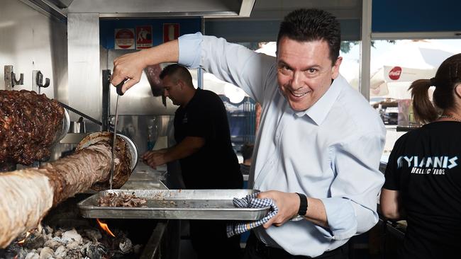 Ready to serve? Nick Xenophon at Yianni’s on Hindley in Adelaide. Picture: AAP