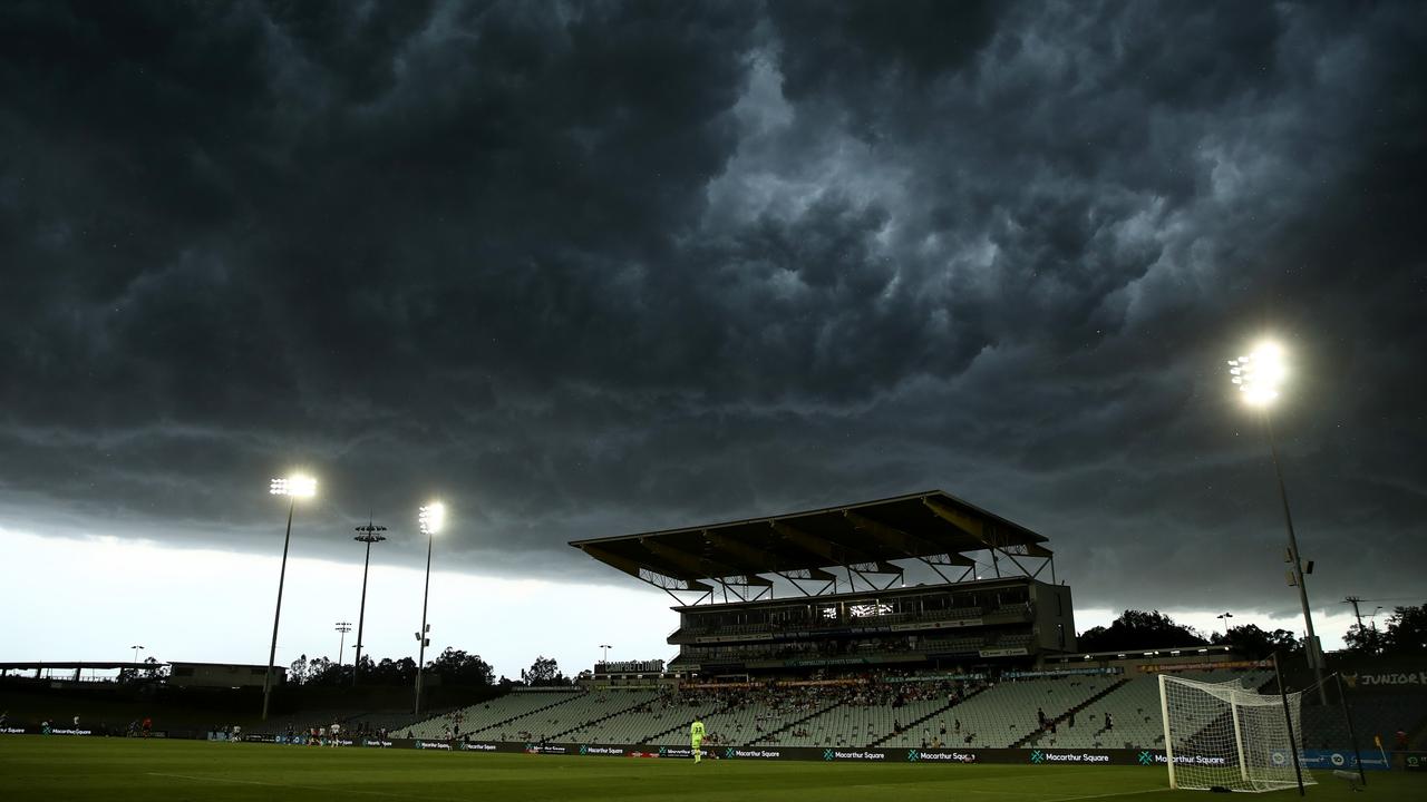 SYDNEY, AUSTRALIA – FEBRUARY 18: Storm clouds form during the round 17 A-League Men's match between Macarthur FC and Newcastle Jets at Campbelltown Stadium on February 18, 2023 in Sydney, Australia. (Photo by Jason McCawley/Getty Images)