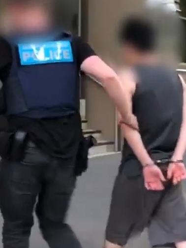 Police move in to make an arrest. Picture: Australian Federal Police