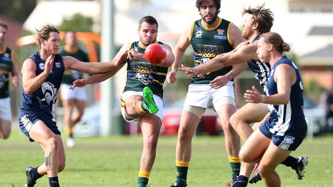 Thomas Evans (Pembroke) kicks the ball during the first quarter against Henley earlier in the year. Picture: Stephen Laffer