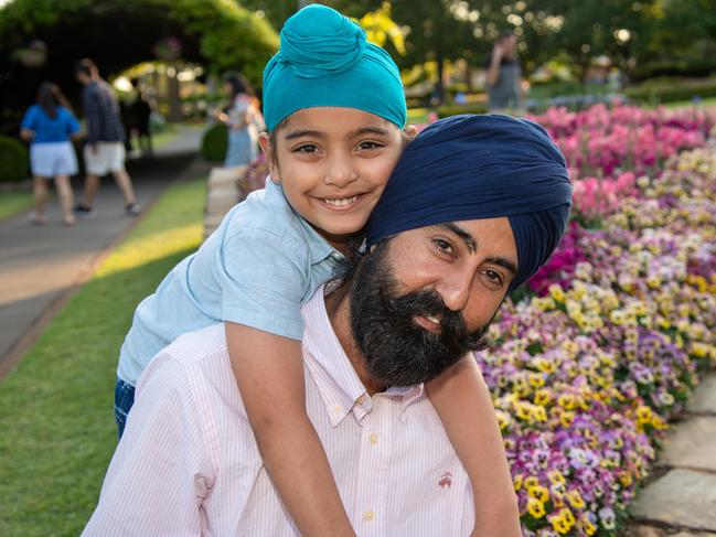 Kulpeed Singh and his son Waris in Laurel Bank Park for the Carnival of Flowers, Sunday September 22, 2024. Picture: Bev Lacey