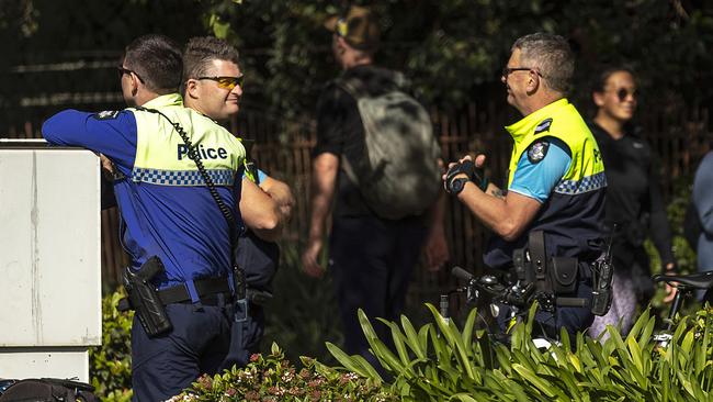 Police along 'The Tan' running track. Picture: Getty