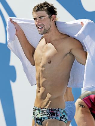 Romance rumours ... A relaxed Michael Phelps during trainig at the Pan Pacs on the Gold Coast. Picture: Luke Marsden.