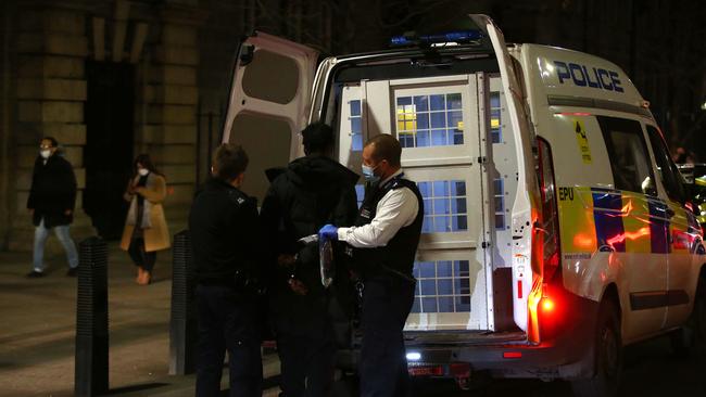 Met Police officers arrest a man at Westminster Bridge in London, United Kingdom. Picture: Getty