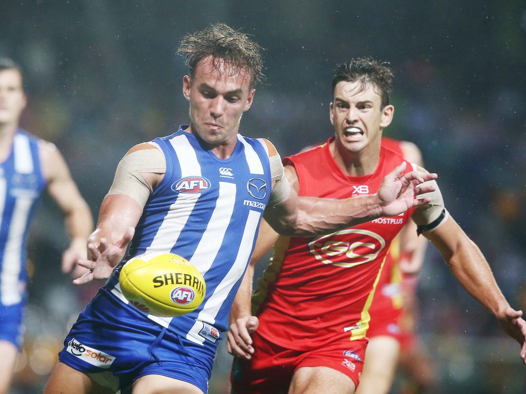 Action from the AFL match between the Gold Coast Suns and the North Melbourne Kangaroos, held at Cazalys Stadium, Cairns. North Melbourne's Ryan Clarke. PICTURE: BRENDAN RADKE