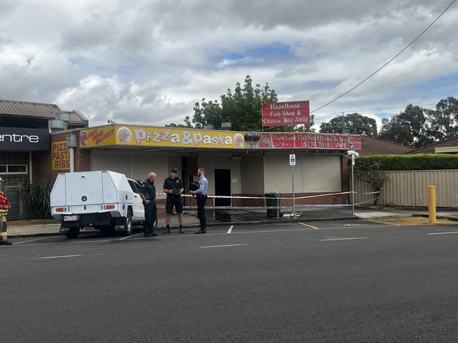 Big Al's Pizza and Pasta and Hazelbank Fish Shop &amp; Chinese Takeaway were sealed off with police tape while authorities investigated the incident. Picture: Jack Colantuono