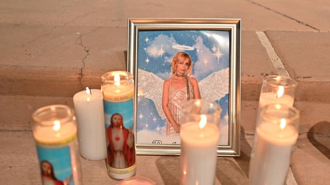 Candles are placed around a photo of cinematographer Halyna Hutchins during a vigil held in her honour at Albuquerque Civic Plaza. Picture: by Sam Wasson/Getty Images