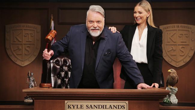 Kyle Sandilands on the set of Trail By Kyle alongside his Anna Heinrich, who advises him of the legal background on cases. Picture: Sam Ruttyn