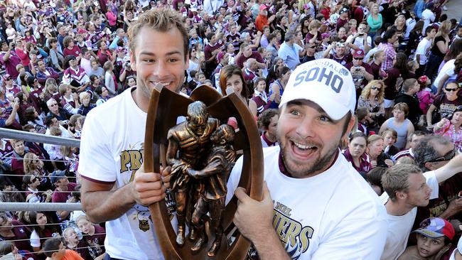 Double Delight: Brett (left) and Glenn Stewart hold the trophy on the following day at Brookvale Oval. (AAP Image/Paul Miller)