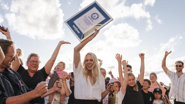 Laura Enever accepts the official Guinness World Record certificate for largest wave surfed paddle-in (female) on November 6, 2023 at Sydney, New South Wales, Australia. (Photo by Matt Dunbar/World Surf League)