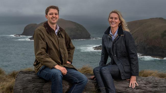 James and Madeleine Roberts-Thomson overlooking The Doughboys and Bass Strait at Cape Grim. Picture: Phillip Biggs