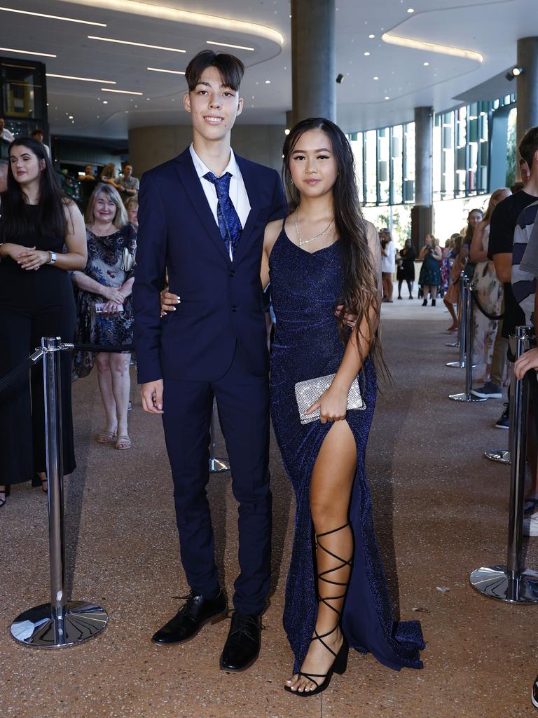 Jed White and Cathy Xiong arrive at the Peace Lutheran College formal evening at the Cairns Convention Centre. Picture: Brendan Radke