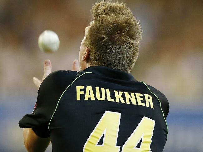 James Faulkner completes a catch to earn Pat Cummins a wicket. Picture: Wayne Ludbey.