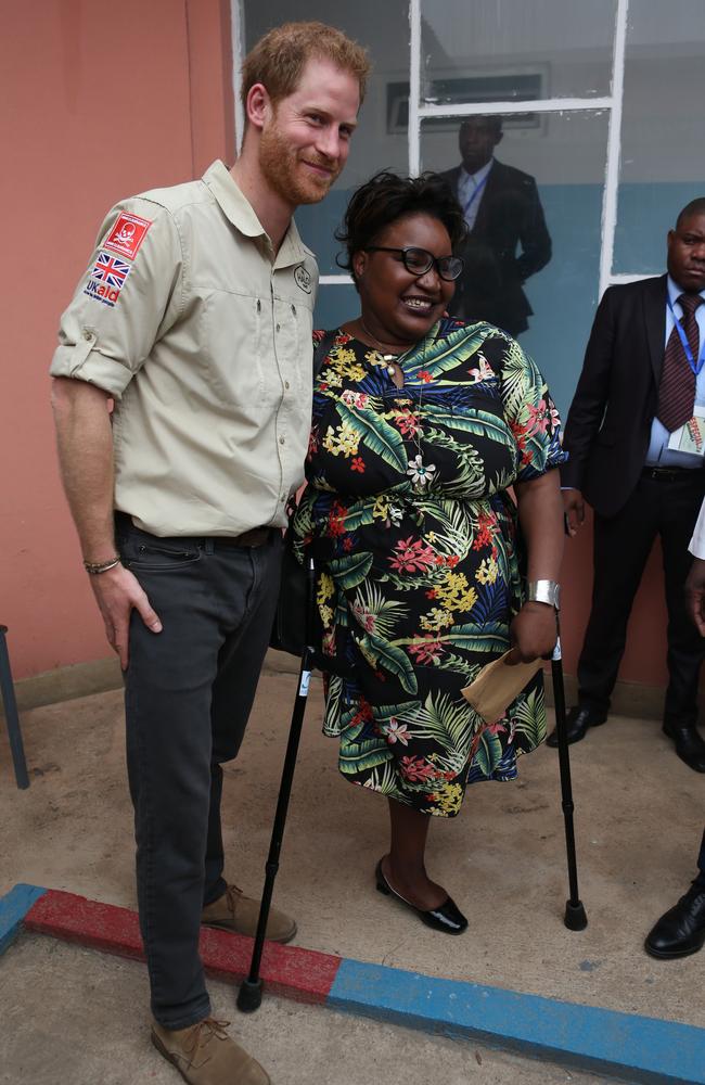 Prince Harry meets patients as he visits the Princess Diana Orthopaedic Centre in Huambo, on the royal tour of Africa. Picture: Getty Images