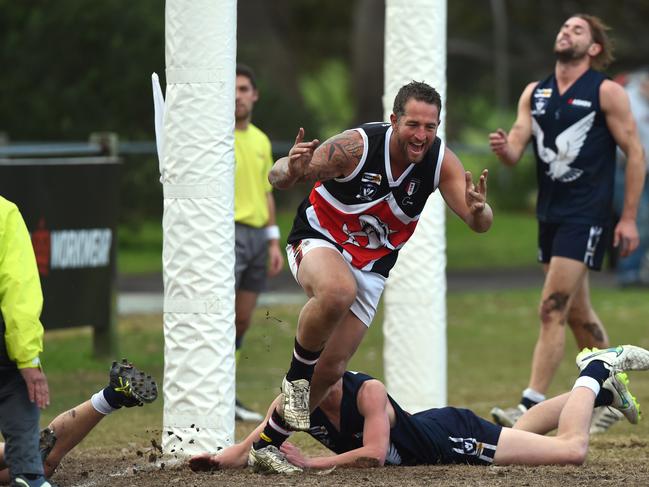 Peninsula league football: Edi-Aspendale v Bonbeach at Aspendale. Bonbeach forward #48 Luke Damon gets his boot to the ball to score an early goal. Picture: Chris Eastman