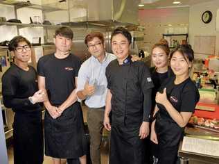 Sushi 79 has opened at Brassall, pictured is owner Hans Kim and chef David Lee (centre) with staff at their new restaurant. Photo Inga Williams / The Queensland Times