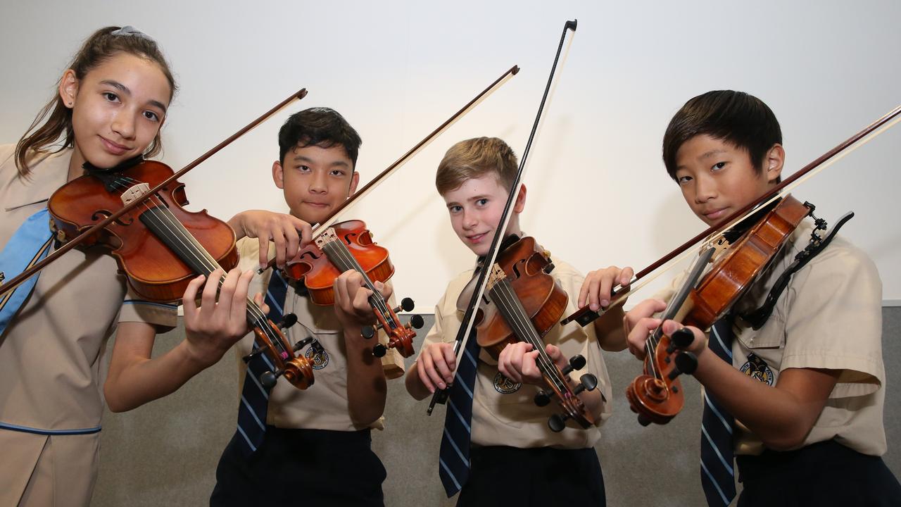 The All Saints Secondary School String Quartet warm up. Picture: Glenn Hampson.