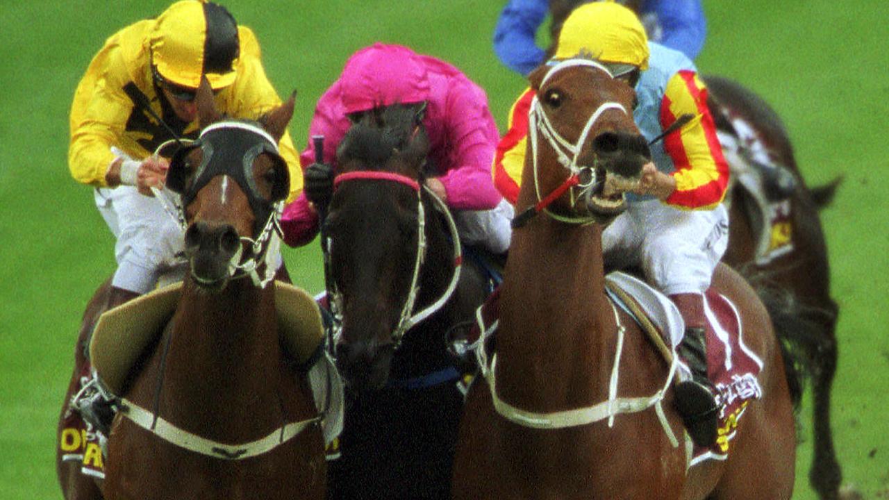 Horseracing - Racehorse Viscount (c) squeezed between Northerly (l) and Sunline (r) during Cox Plate race at Moonee Valley 27 Oct 2001.  a/ct