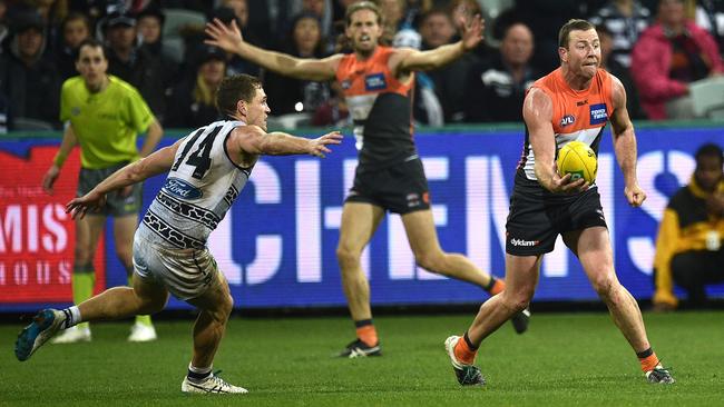Joel Selwood and Steve Johnson exchanged words during Saturday’s clash