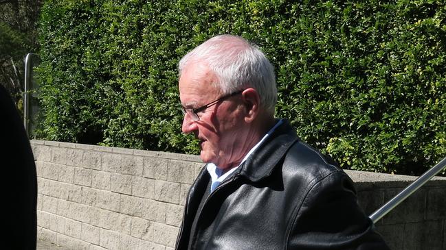 Edward James Anthes, 83, leaving court with his solicitor after pleading guilty to an incident at Central Coast Stadium. A further charge of sexually touching a child was withdrawn. Picture: Richard Noone