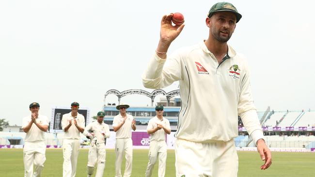 Lyon is applauded after claiming seven wickets. (Robert Cianflone/Getty Images)