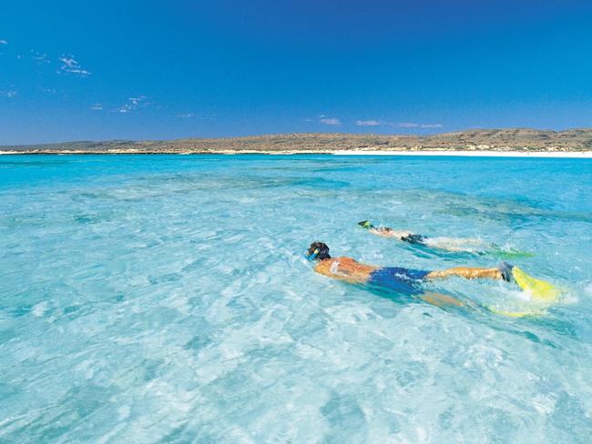 ESCAPE: AUSTRALIA WILDERNESS ..  Couple snorkelling off Turquoise Beach, at Ningaloo Marine Park . Picture: Tourism W.A.