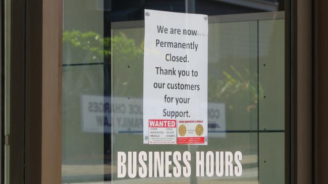 The signs tell a sad story of the shopping strip. Photo: Kristy Muir