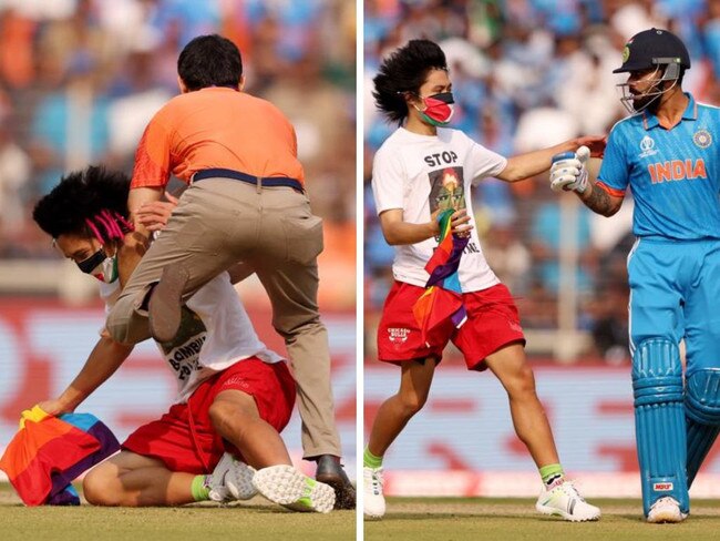 A protester rocks the World Cup final between Australia and India. Photos: Getty Images