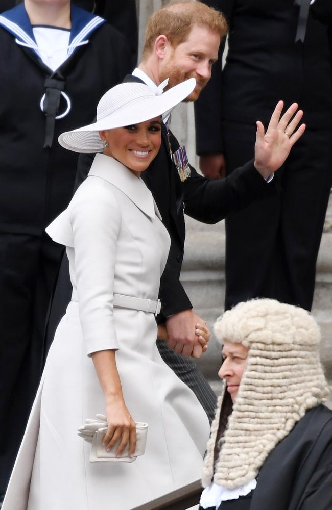 All smiles as the pair are reunited with other members of the Royal Family for first time in two years. Photo: Chris J Ratcliffe/Getty Images