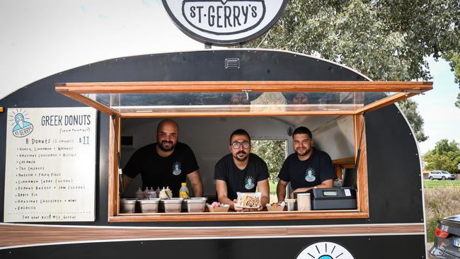 Number 8: St Gerry’s owner Dean Giannakis, centre, with Manos Maroudis, left, and Michal Zapantis, right. Picture: Penny Stephens