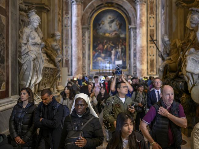Faithful leave St Peter's Basilica after viewing the body of Pope Francis. Picture: Getty Images