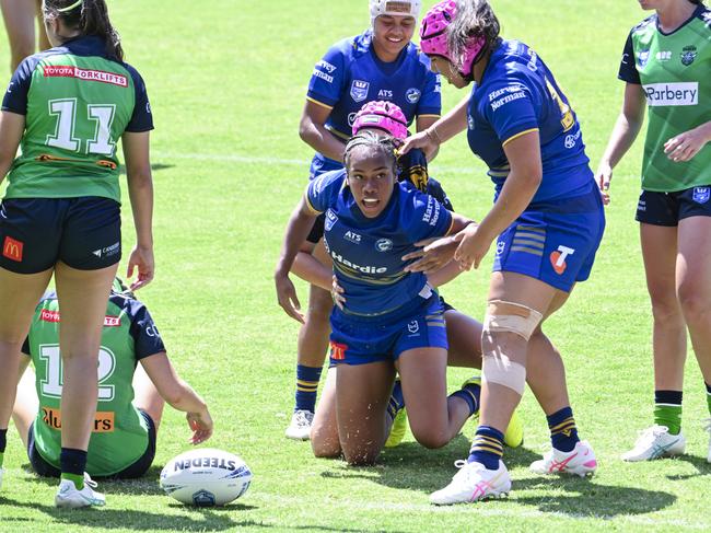 Mere Sivo scores a try. Picture: Martin Ollman