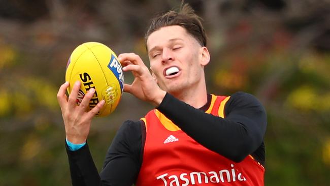 MELBOURNE, AUSTRALIA - APRIL 16: Jacob Koschitzke of the Hawks marks the ball during a Hawthorn Hawks AFL training session at Waverley Park on April 16, 2021 in Melbourne, Australia. (Photo by Mike Owen/Getty Images)