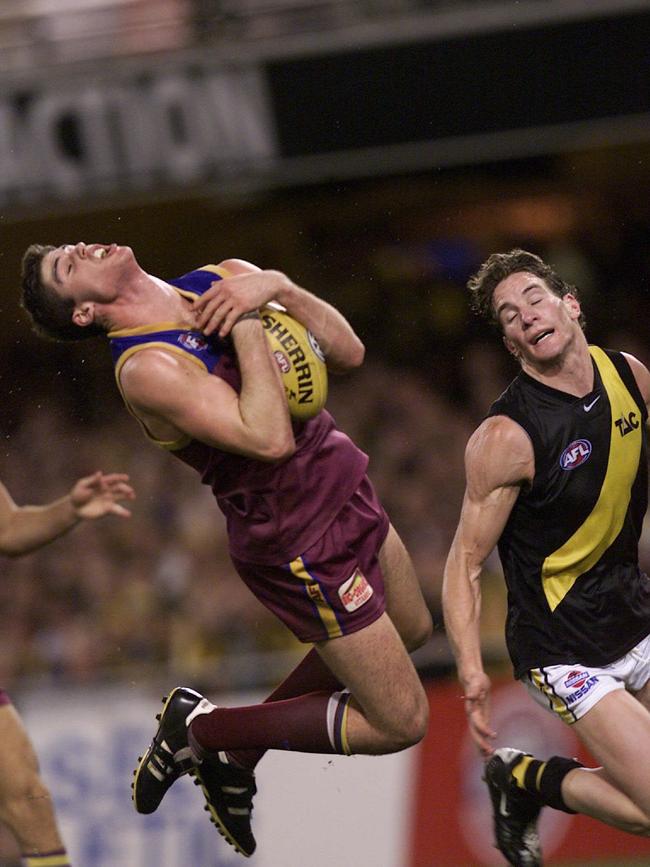 Jonathan Brown marks during the preliminary final win over Richmond at the Gabba in 2001. Picture: David Kapernick