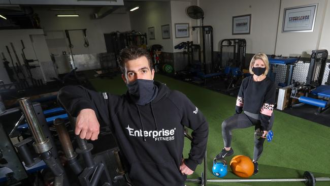 Gym owner Mark Ottobre and gym goer Ellen Williams are pushing for the government to reopen gyms. Picture: Alex Coppel