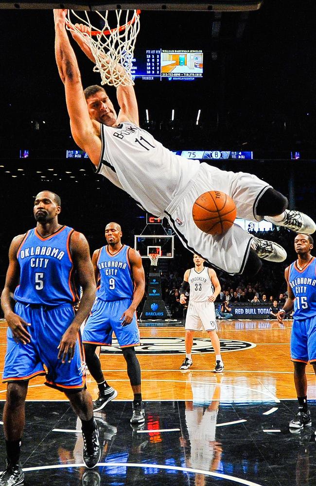 The Nets’ Brook Lopez dunks the ball in the third quarter during a game against Oklahoma City.