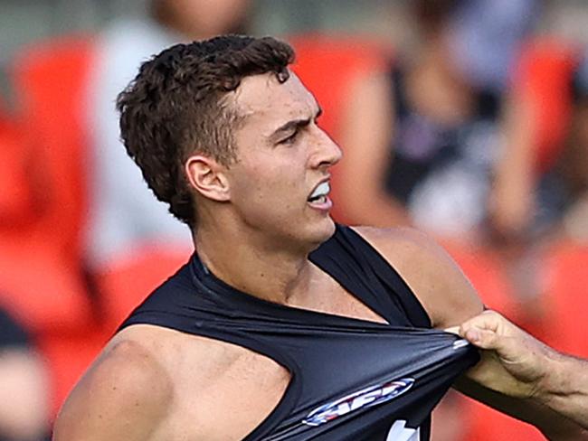 GOLD COAST, AUSTRALIA - SEPTEMBER 13: Tom Williamson of the Blues and Chayce Jones of the Crows wrestle during the round 17 AFL match between the Carlton Blues and the Adelaide Crows at Metricon Stadium on September 13, 2020 in Gold Coast, Australia. (Photo by Chris Hyde/Getty Images)