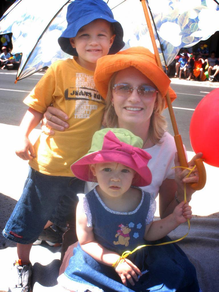 Carnival of Flowers – Susie Golgerth, son Triston, 3, and Tia-Lee, 2, from Forest Lake at the parade in Toowoomba. Pic: David Martinelli.