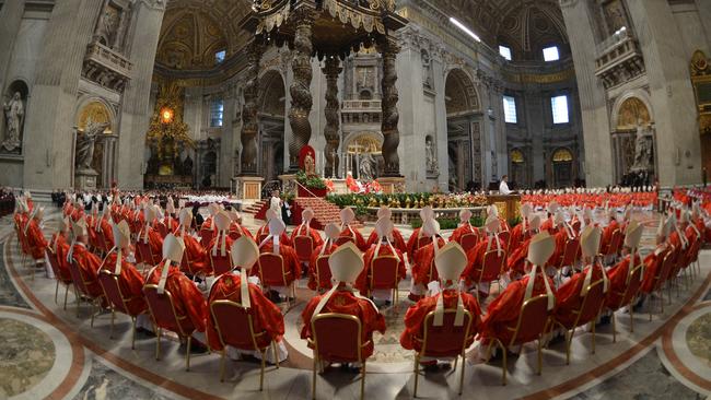 Cardinals attend a mass at the St Peter's basilica before the start of the conclave on March 2013 at the Vatican. Picture: AFP