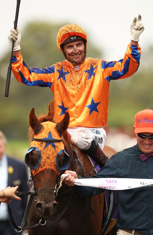 Champion New Zealand jockey Opie Bosson celebrates winning the Group 1 Rosehill Guineas. Picture: Getty Images