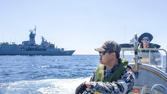 Royal Australian Navy sailor contribute to the search for a missing Indonesian submarine.