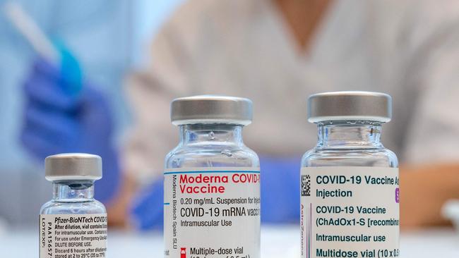 Used vaccine vials that contained (L-R) Pfizer-BioNTech, Moderna and AstraZeneca Covid-19 vaccines are pictured at the Skane University Hospital vaccination centre in Malmo, Sweden, on February 17, 2021. (Photo by Johan NILSSON / TT NEWS AGENCY / AFP) / Sweden OUT