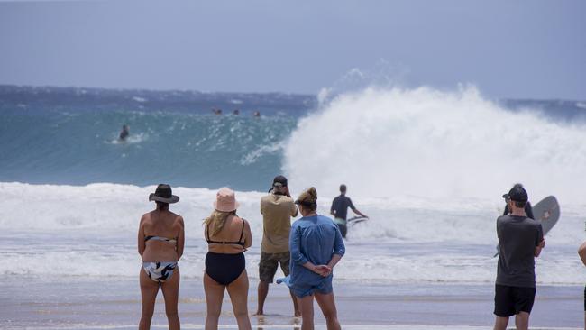 The crowds watching surfers at Snapper Rocks on Sunday 2 January 2022. Picture: Jerad Williams