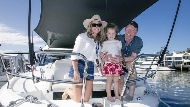 Renee, Ellie and Dax Bykerk at the Sanctuary Cove Boat Show. Picture: Glenn Campbell